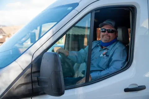 Basin Medical driver seated in a transport vehicle